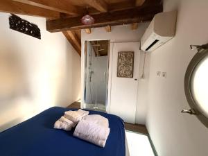 Postel nebo postele na pokoji v ubytování Iancura - B&B di design a Salina