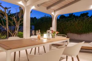 Fotografie z fotogalerie ubytování Arba apartmani v destinaci Barbat na Rabu + 135 fotografií