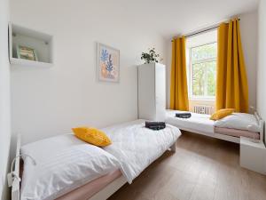Ένα ή περισσότερα κρεβάτια σε δωμάτιο στο Vista Residence