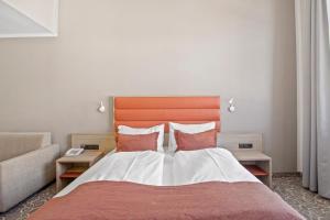 Postel nebo postele na pokoji v ubytování Hotel Schild