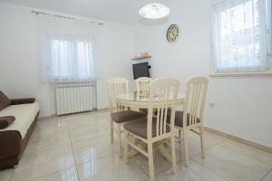 Posedenie v ubytovaní Apartmani Cimerman