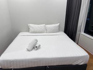 En eller flere senge i et værelse på Sky Suite By Leisure KLCC + 20 billeder