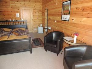 Posezení v ubytování Chambre d'hôte L'Arrivée