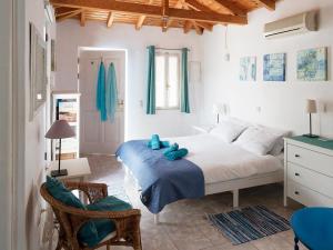 Posteľ alebo postele v izbe v ubytovaní Summer Garden Studio - village location