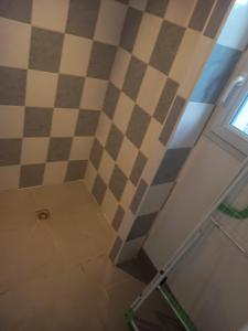 a room with a box next to a door at le cantalou in Rinxent +5 photos