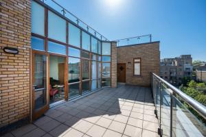 an exterior view of a building with a balcony at Staycity Aparthotels Dublin Augustine in Dublin