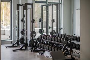 Centrul de fitness și/sau facilități de fitness de la Beatrice Apartment in Odyssey Pool & Spa-parking