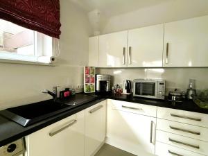 Køkken eller tekøkken på Pension Auwirt Saalbach + 34 billeder