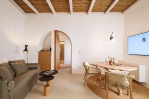 a living room with a couch and a table at Borgo delle Dimore in Maglie