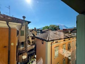 a view of a city with buildings at 1Dest - Riva Life in Riva del Garda