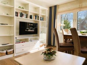 TV a/nebo společenská místnost v ubytování Leuchtturm