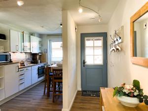 Kuchyň nebo kuchyňský kout v ubytování Leuchtturm