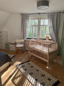 Postel nebo postele na pokoji v ubytování Ferienhaus Frerichs 15209