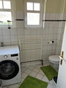 Koupelna v ubytování Ferienhaus Frerichs 15209