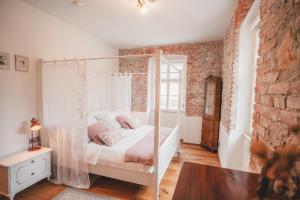 Łóżko lub łóżka w pokoju w obiekcie Apartments Kienberg