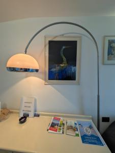 Fotografie z fotogalerie ubytování appartamenti i fiori del lago v destinaci Laveno
