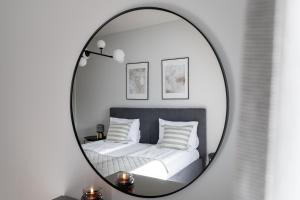 Posteľ alebo postele v izbe v ubytovaní Scala 60C City Center Apartments with Parking by Lion Apartments