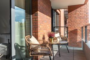 Posedenie v ubytovaní Scala 60C City Center Apartments with Parking by Lion Apartments