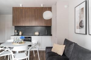 Kuchyňa alebo kuchynka v ubytovaní Scala 60C City Center Apartments with Parking by Lion Apartments