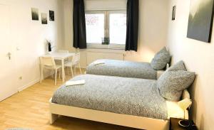 Postel nebo postele na pokoji v ubytování Business & Handwerker Unterkunft - Zentral & Praktisch