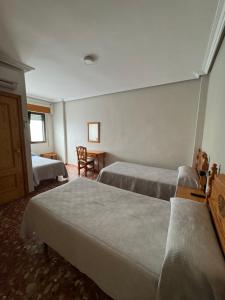 Postel nebo postele na pokoji v ubytování L'Oncle Pere Habitacions