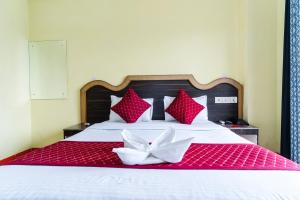 HOTEL NILADRII GALAXY客房内的一张或多张床位