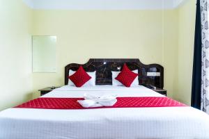 HOTEL NILADRII GALAXY客房内的一张或多张床位