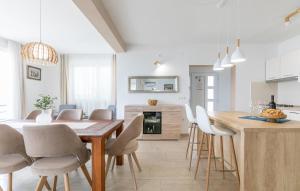 a kitchen and dining room with a table and chairs at Villa Rania - Korcula by Villas Guide in Blato