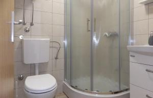 a bathroom with a shower and a toilet and a sink at Villa Rania - Korcula by Villas Guide in Blato +20 photos