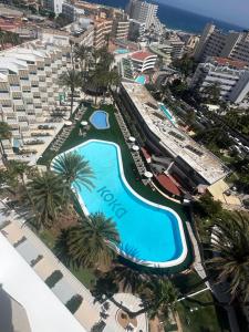 an aerial view of a resort with a swimming pool at Koka Beach in Playa del Ingles