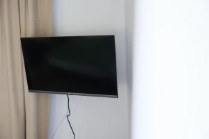 TV a/nebo společenská místnost v ubytování B&B Italia Rende