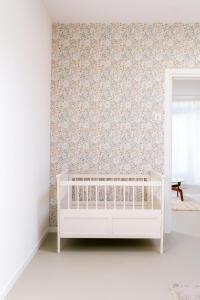 Ένα ή περισσότερα κρεβάτια σε δωμάτιο στο Nice bright studio near the forest and Amsterdam