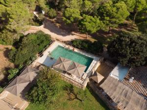 Bazén v ubytování Faustino Gran Relais & Chateaux nebo v jeho okolí