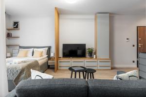 Posteľ alebo postele v izbe v ubytovaní Scala 60C City Center Apartments & Studio by Lion Apartments