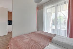 Posteľ alebo postele v izbe v ubytovaní Scala 60C City Center Apartments & Studio by Lion Apartments