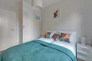 Posteľ alebo postele v izbe v ubytovaní Scala 60C City Center Apartments & Studio by Lion Apartments