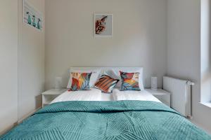 Posteľ alebo postele v izbe v ubytovaní Scala 60C City Center Apartments & Studio by Lion Apartments