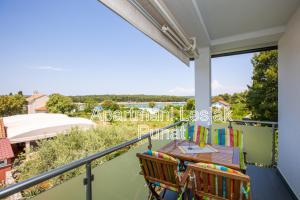 Balkón nebo terasa v ubytování Apartmani Lesjak