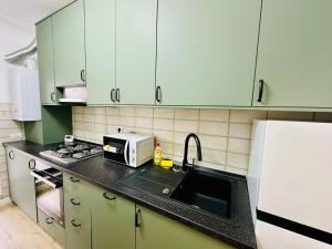 Køkken eller tekøkken på Zen Central Studio