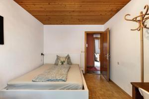Ein Bett oder Betten in einem Zimmer der Unterkunft Jordis