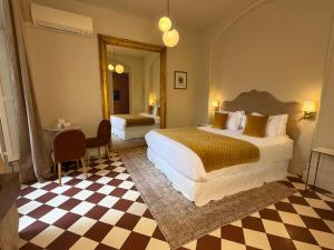 Boutique Hôtel Château Beaupin Restaurant & Wellness客房内的一张或多张床位
