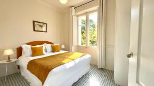 Boutique Hôtel Château Beaupin Restaurant & Wellness客房内的一张或多张床位