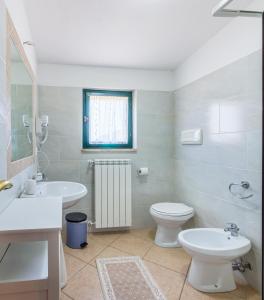 Bilik mandi di Agriturismo Paulesa