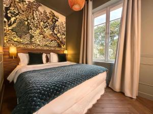 Boutique Hôtel Château Beaupin Restaurant & Wellness客房内的一张或多张床位
