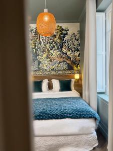 Boutique Hôtel Château Beaupin Restaurant & Wellness客房内的一张或多张床位