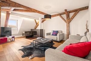 Posezení v ubytování Ferienwohnung Insel-Loft - Maisonette auf der Insel, exklusiv mit Dachterrasse