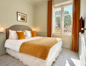 Boutique Hôtel Château Beaupin Restaurant & Wellness客房内的一张或多张床位