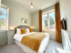 Boutique Hôtel Château Beaupin Restaurant & Wellness客房内的一张或多张床位