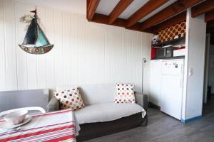 Ένα ή περισσότερα κρεβάτια σε δωμάτιο στο Appartement en duplex 2* Résidence Les Pêcheurs