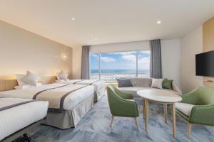Postel nebo postele na pokoji v ubytování KAMENOI HOTEL Kujukuri